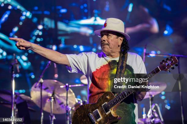 Guitarist Carlos Santana of Santana performs on stage at North Island Credit Union Amphitheatre on June 17, 2022 in Chula Vista, California.