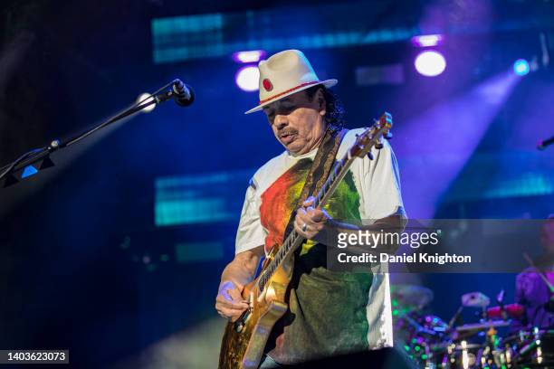 Guitarist Carlos Santana of Santana performs on stage at North Island Credit Union Amphitheatre on June 17, 2022 in Chula Vista, California.