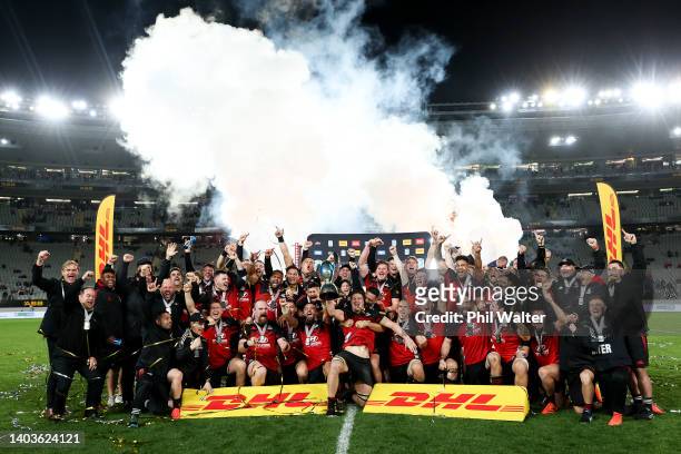 The Crusaders celebrate after winning the 2022 Super Rugby Pacific Final match between the Blues and the Crusaders at Eden Park on June 18, 2022 in...