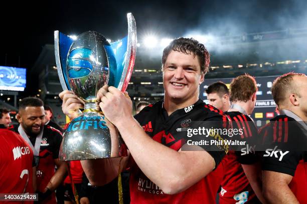 Scott Barrett of the Crusaders holds the Super Rugby Pacific trophy after winning the 2022 Super Rugby Pacific Final match between the Blues and the...