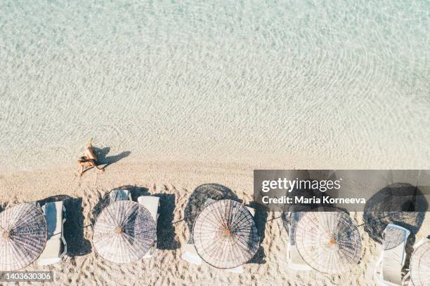 woman swimming in beautiful clear water. - see through swimsuit ストックフォトと画像