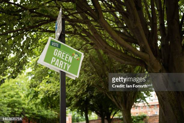 Placard promoting the Green Party hangs from a lamppost ahead of the by-election on June 18, 2022 in Wakefield, England. The Wakefield By-election...