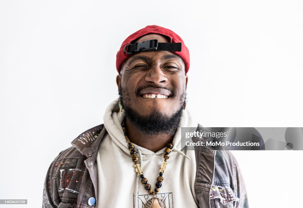Studio portrait of male hip-hop dancer
