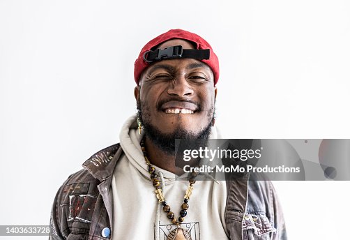 Studio portrait of male hip-hop dancer Studio portrait of male hip-hop dancer