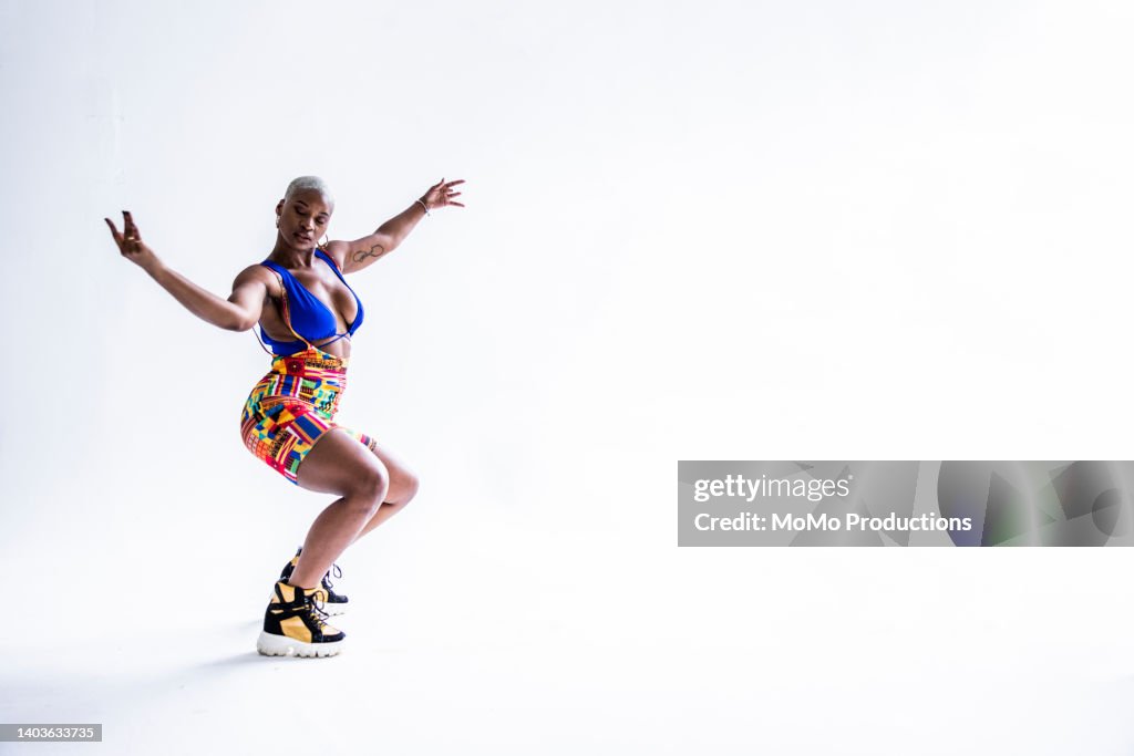 Studio portrait of fashionable female professional dancer