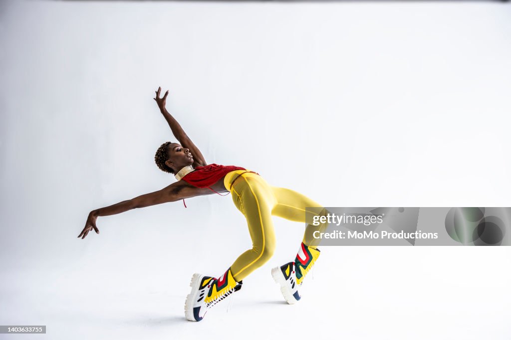 Studio portrait of fashionable female professional dancer