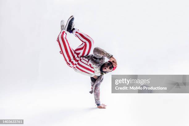 studio portrait of fashionable male professional dancer - modeshow stock-fotos und bilder