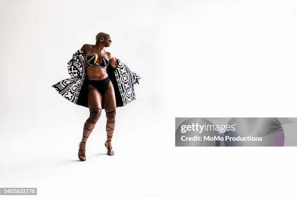 studio portrait of fashionable female professional dancer - black slip fotografías e imágenes de stock