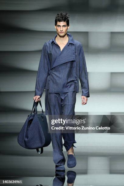 Model walks the runway at the Emporio Armani fashion show during the Milan Fashion Week S/S 2023 on June 18, 2022 in Milan, Italy.