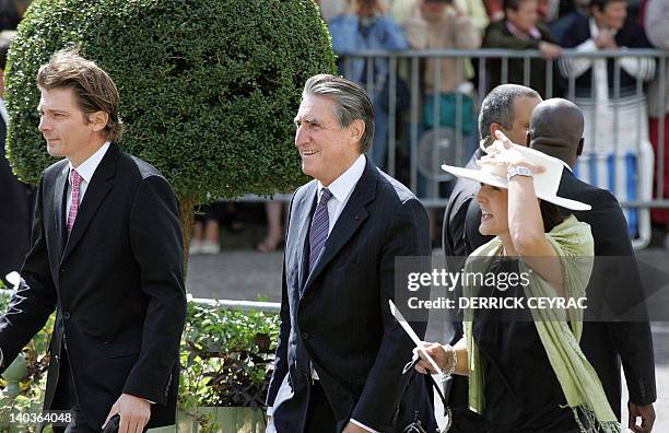 Former head of French employers' federation Medef Ernest-Antoine Seilliere arrives with his wife Antoinette at the Bazas' cathedral to attend the...