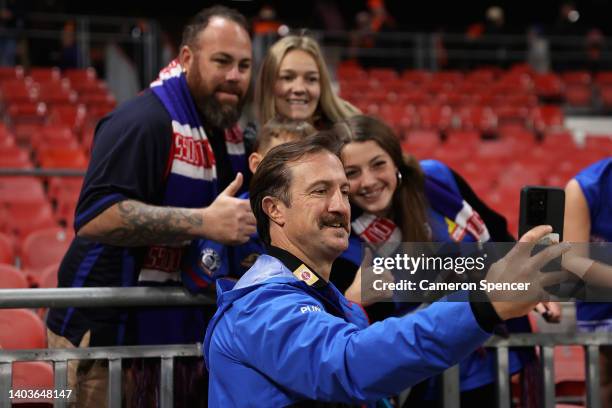 Bulldogs head coach Luke Beveridge poses with fans after winning the round 14 AFL match between the Greater Western Sydney Giants and the Western...