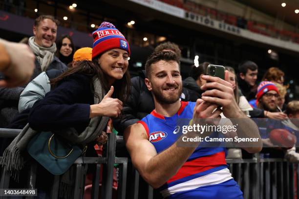 Marcus Bontempelli of the Bulldogs poses with fans after winning the round 14 AFL match between the Greater Western Sydney Giants and the Western...