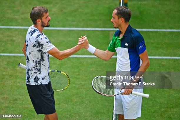 Daniil Medvedev of Russia and Oscar Otte of Germany shake hands after their match during day eight of the 29th Terra Wortmann Open at OWL-Arena on...