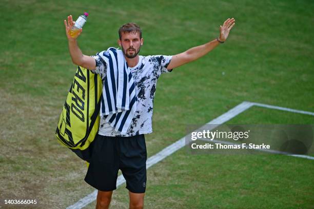 Oscar Otte of Germany says goodbye to the audience after losing his match against Daniil Medvedev of Russia during day eight of the 29th Terra...