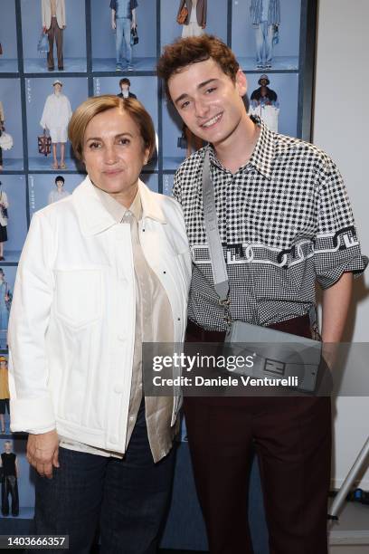 Silvia Venturini Fendi and Noah Schnapp are seen at the Backstage ahead of the Fendi Fashion Show during Milan Men's Fashion Week on June 18, 2022 in...