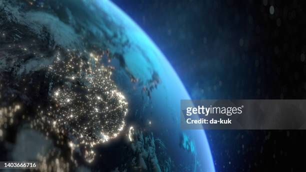 planet earth at night with city light illumination. view from space. 3d render - fine china stock pictures, royalty-free photos & images