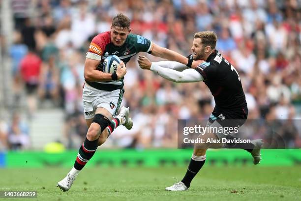 Freddie Steward of Leicester Tigers is challenged by Elliot Daly of Saracens during the Gallagher Premiership Rugby Final match between Leicester...