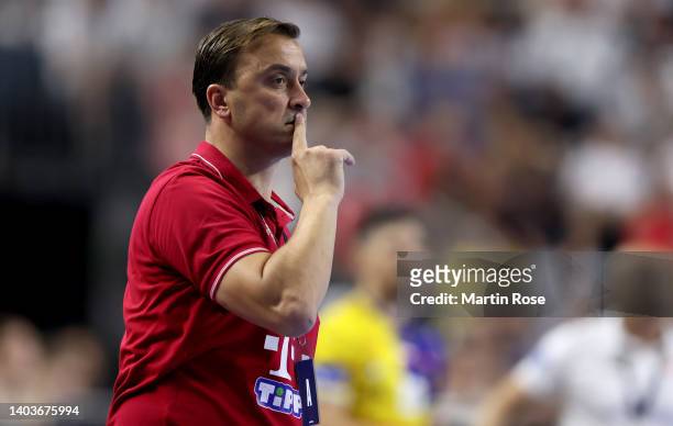 Ilic Momir, head coach of Telekom Veszprem reacts during the EHF Champions League Final4 Men second semi final match between Telekom Veszprem HC and...