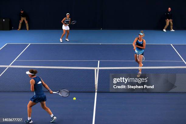 Elise Mertens of Belgium and partner Shuai Zhang of China play against Latisha Chan of Chinese Taipei and partner Samantha Stosur of Australia in the...