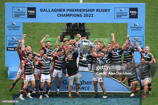 Tom Youngs and Ellis Genge of Leicester Tigers, lift the Gallagher Premiership Trophy after the final whistle of the Gallagher Premiership Rugby...