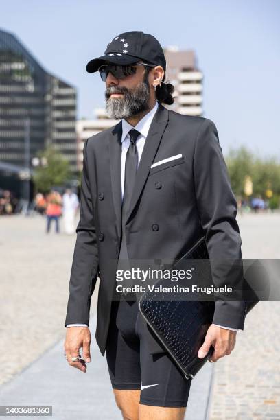 Graziano di Cintio is seen ahead of the MSGM fashion show wearing shorts and vest during the Milan Fashion Week S/S 2023 on June 18, 2022 in Milan,...