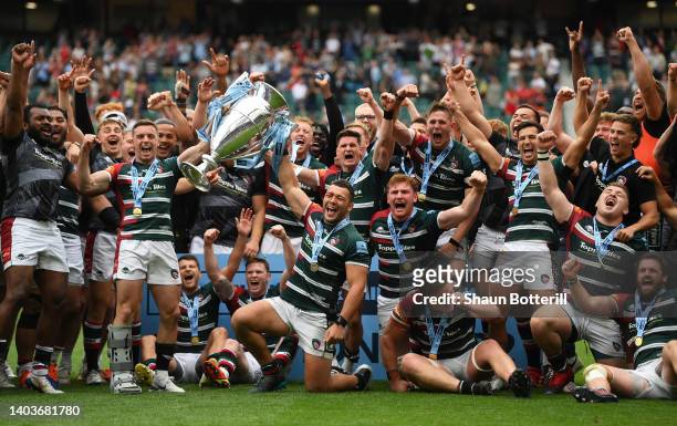 George Ford and Ellis Genge of Leicester Tigers lift the Gallagher Premiership Trophy as Leicester Tigers celebrate after the final whistle of the...