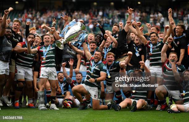 George Ford and Ellis Genge of Leicester Tigers lift the Gallagher Premiership Trophy as Leicester Tigers celebrate after the final whistle of the...