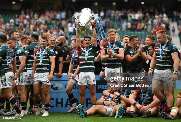 Freddie Burns of Leicester Tigers lift the Gallagher Premiership Trophy as Leicester Tigers celebrate after the final whistle of the Gallagher...