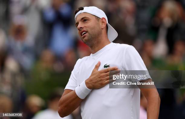 Filip Krajinovic of Serbia celebrates winning against Marin Cilic of Croatia during the Men's Singles Semi-Final match on day six of the cinch...