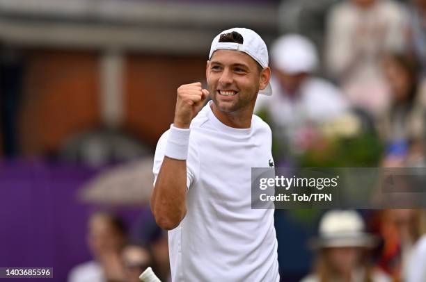 Filip Krajinovic of Serbia celebrates his victory over Marin Cilic of Serbia during day six of the cinch Championships at The Queen's Club on June...