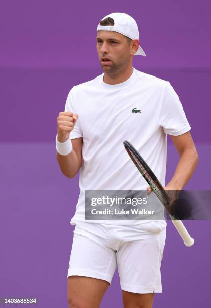 Filip Krajinovic of Serbia celebrates a point against Marin Cilic of Croatia during the Men's Singles Semi-Final match on day six of the cinch...