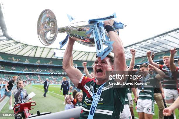 Freddie Burns of Leicester Tigers celebrate as they lift the Gallagher Premiership Trophy in front of the Leicester Tigers fans after the final...