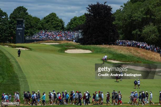 General view of the fifth hole is seen as Bryson DeChambeau of the United States and Harris English of the United States walk the fairway during the...
