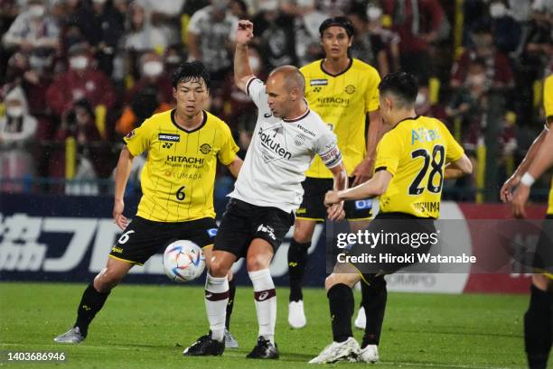 Keiya Shiihashi of Kashiwa Reysol and Andres Iniesta of Vissel Kobe compete for the ball during the J.LEAGUE Meiji Yasuda J1 17th Sec. Match between...