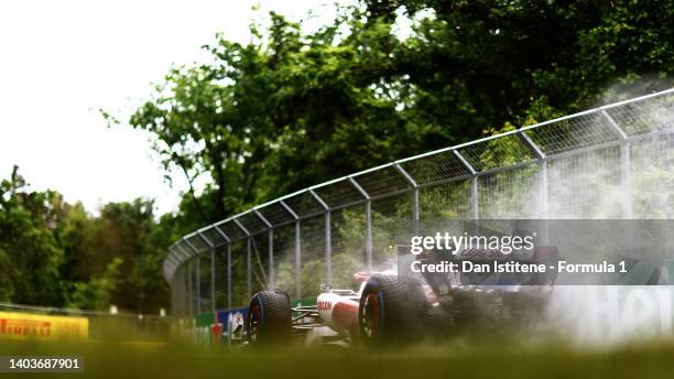 Zhou Guanyu of China driving the Alfa Romeo F1 C42 Ferrari in the wet during final practice ahead of the F1 Grand Prix of Canada at Circuit Gilles...