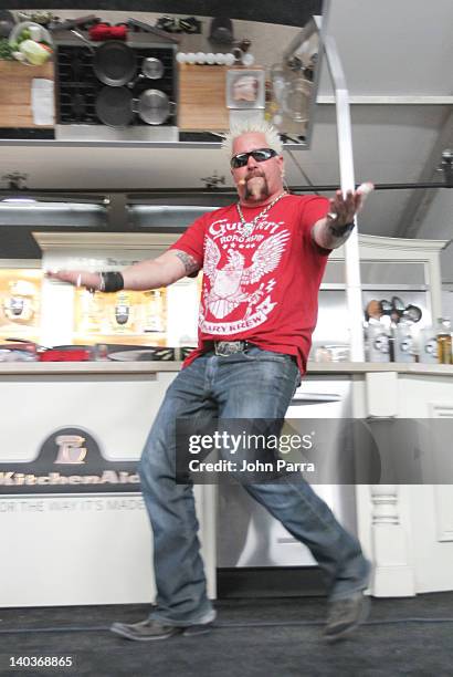 Guy Fieri attends the Whole Foods Grand Tasting Village at the 2012 South Beach Wine and Food Festival on February 25,2012 in Miami Beach,Florida.