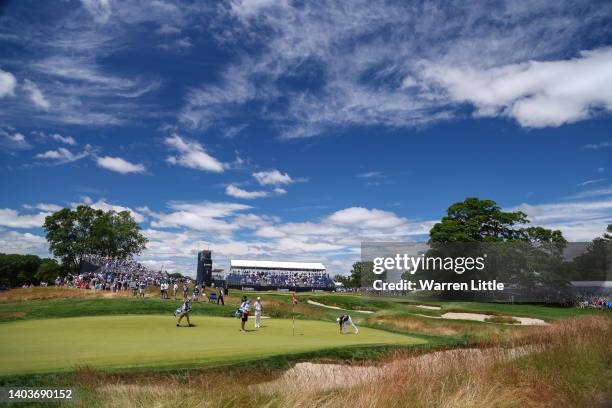 General view is seen as Tyrrell Hatton of England plays the fifth green during the third round of the 122nd U.S. Open Championship at The Country...