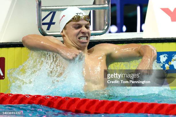 Leon Marchand of Team France celebrates after winning Gold in the Men's 400m Medley Final on day one of the Budapest 2022 FINA World Championships at...