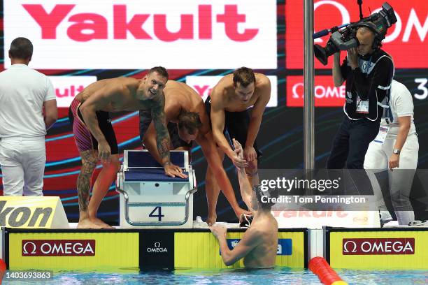 Brooks Curry of Team United States celebrates after winning Gold in the Men's 4x100m Freestyle Relay Final on day one of the Budapest 2022 FINA World...