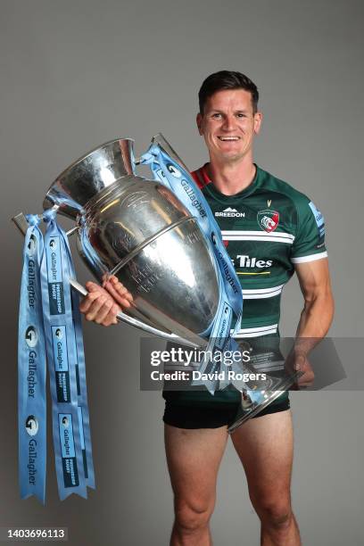 Freddie Burns of Leicester Tigers poses for a photograph with the Gallagher Premiership Trophy after the final whistle of the Gallagher Premiership...