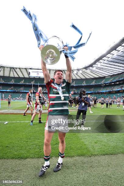 Freddie Burns of Leicester Tigers celebrates with the Gallagher Premiership Trophy after the final whistle of the Gallagher Premiership Rugby Final...