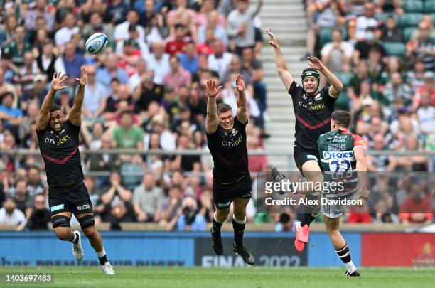 Freddie Burns of Leicester Tigers scores a drop goal to seal victory for Leicester Tigers during the Gallagher Premiership Rugby Final match between...