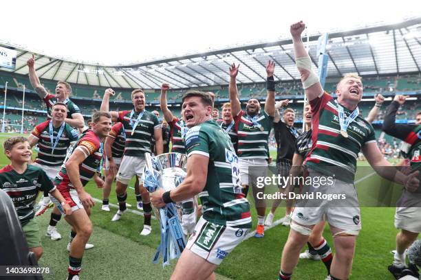 Freddie Burns of Leicester Tigers celebrates with the Gallagher Premiership Trophy after the final whistle of the Gallagher Premiership Rugby Final...