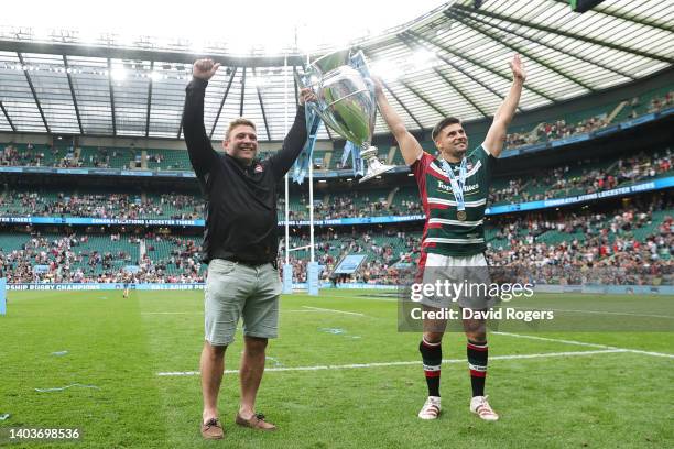 Tom Youngs and Ben Youngs of Leicester Tigers lift the Gallagher Premiership Trophy as they celebrate with fans after the final whistle of the...