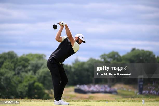 Dustin Johnson of the United States plays his shot from the tenth tee during the third round of the 122nd U.S. Open Championship at The Country Club...