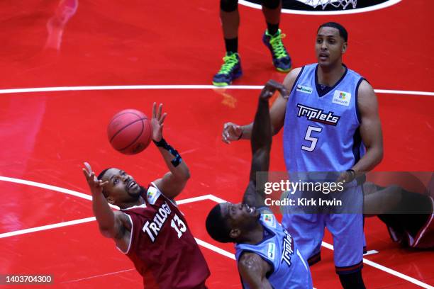 Isaiah Briscoe of the Trilogy rebounds against Joe Johnson of the Triplets during Week One at Credit Union 1 Arena on June 18, 2022 in Chicago,...