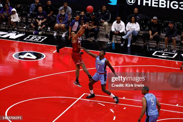 Isaiah Briscoe of the Trilogy attempts a shot against Joe Johnson of the Triplets during Week One at Credit Union 1 Arena on June 18, 2022 in...