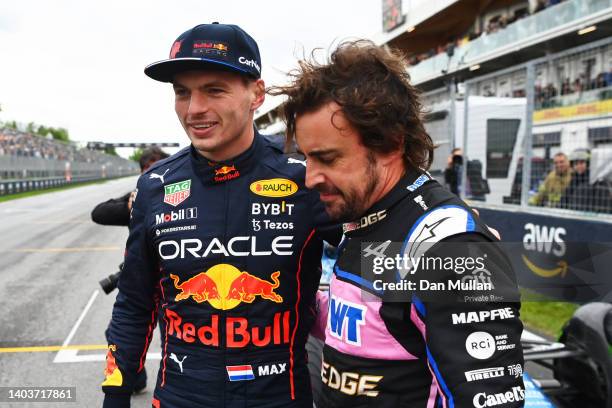 Pole position qualifier Max Verstappen of the Netherlands and Oracle Red Bull Racing talks with Second placed qualifier Fernando Alonso of Spain and...