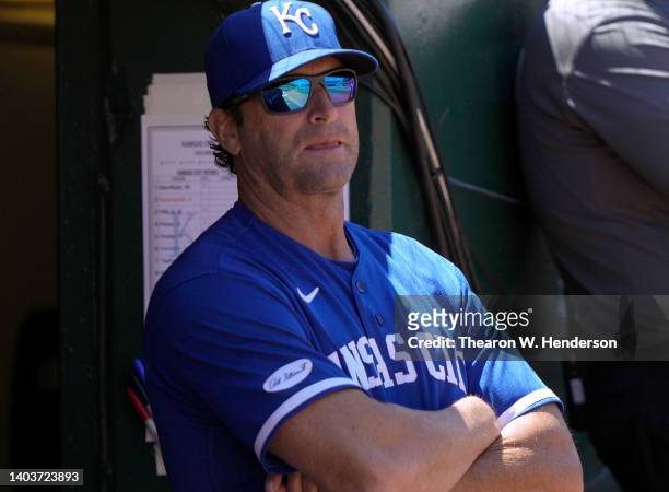 Manager Mike Matheny of the Kansas City Royals looks on from the dugout against the Oakland Athletics in the bottom of the six inning at RingCentral...