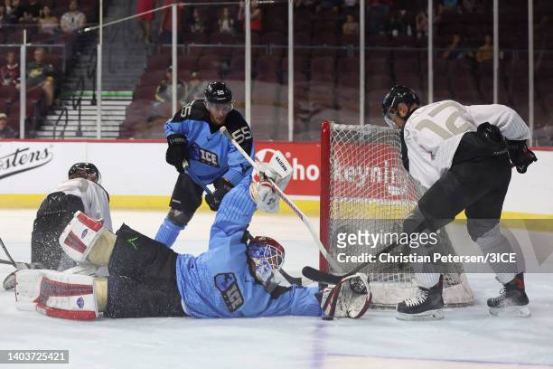 Parker Milner of Team Trottier dives to make a save against Ryan Malone of Team Fuhr in the second half during 3ICE Week One at the Orleans Arena on...